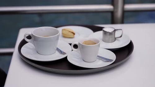 Coffee and Pastry on a Tray