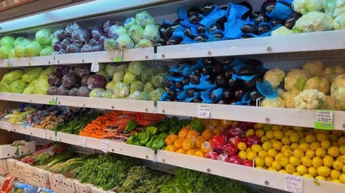Colorful Variety of Fresh Vegetables on Display in Grocery Store Aisle – 4K.