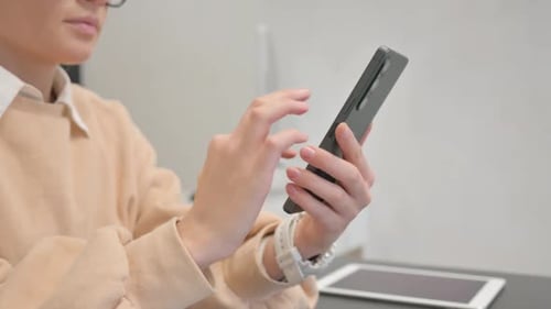 Close up of Woman Browsing Smartphone