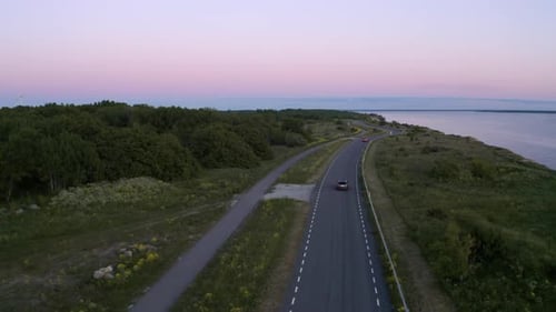 Road in the baltic coast at sunset