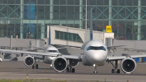 Two Planes in Front of the Terminal