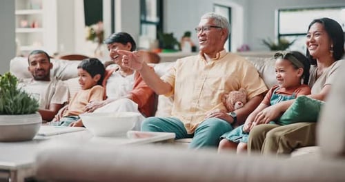 Home, sofa and family relax watching tv, movies or streaming video in Mexico