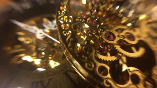 Vintage mechanical timepiece on top of old fashioned pocket watch. Defocused watch hands moving in b