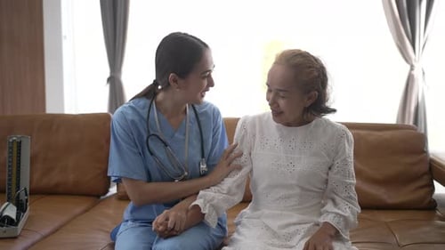 Nurse is take care senior woman at home.