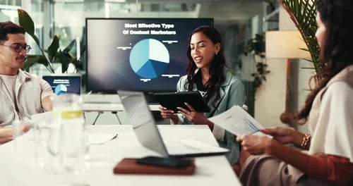 Business Meeting With Data Presentation in Modern Office