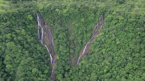 Drone shot of Waterfall in deep forest, Costa Rica - 4K video