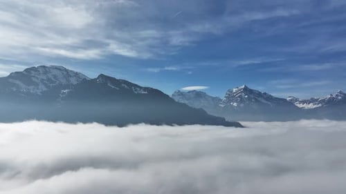 Alpine Peaks Above Sea of Fog at Walensee, Switzerland - aerial