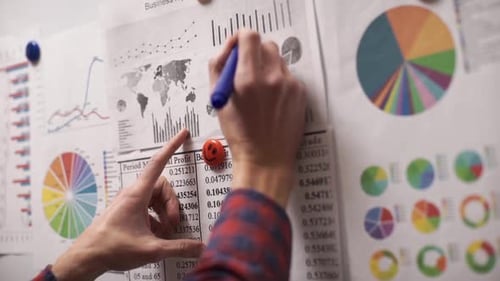 Professional Reviewing Financial Data in Office