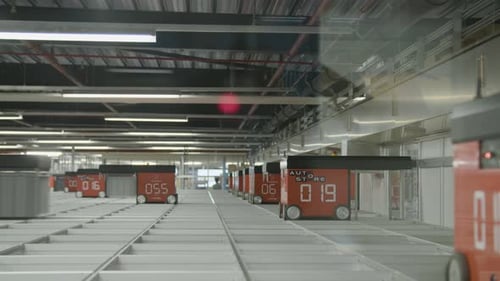 Autostore Robots Operating Inside Automated Warehouse Grid