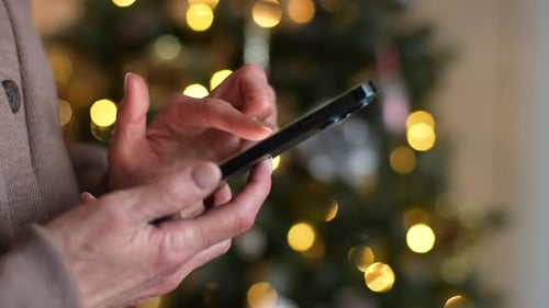 Closeup Hands of Unrecognizable Woman Holding Mobile Phone Typing Online Text Message to Chat Scroll