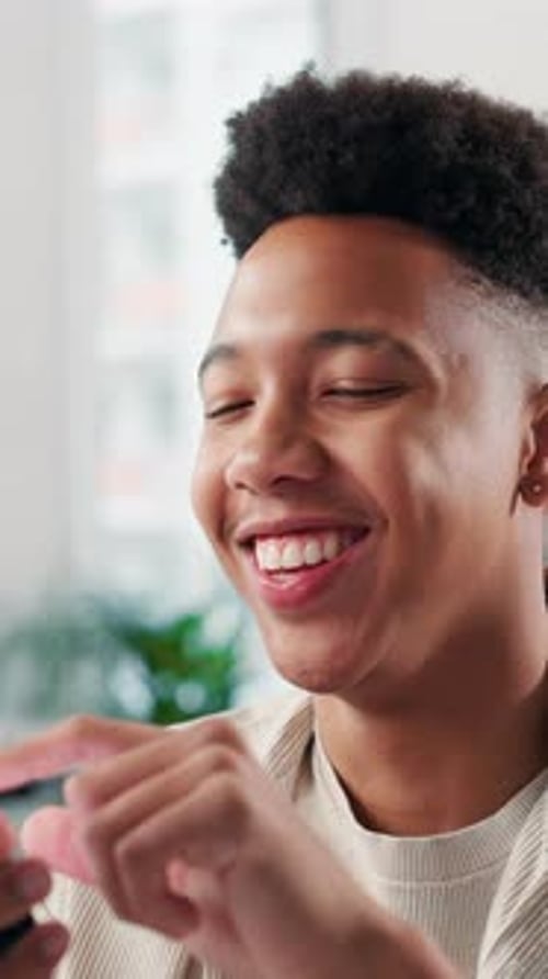 Man, typing and laugh with phone at agency for internet meme, funny online post and work break