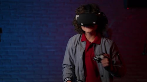 Boy Enjoys a Virtual Reality Game