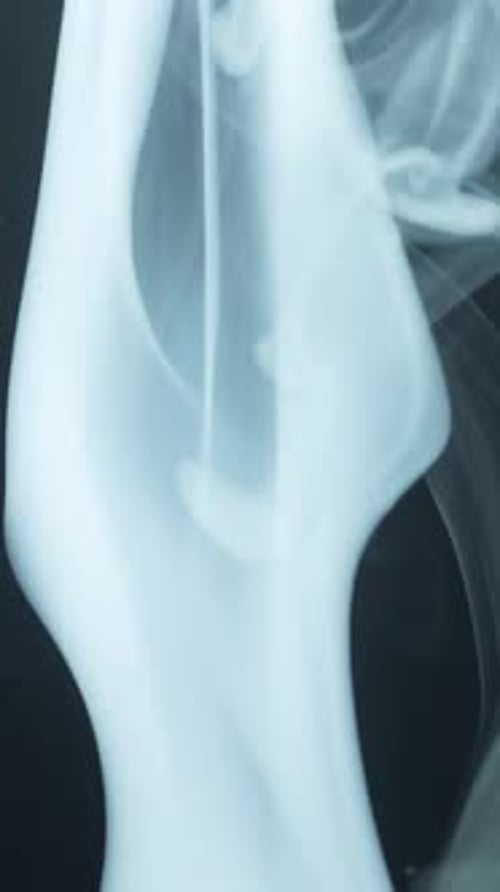 White Smoke Vertical Floating On A Black