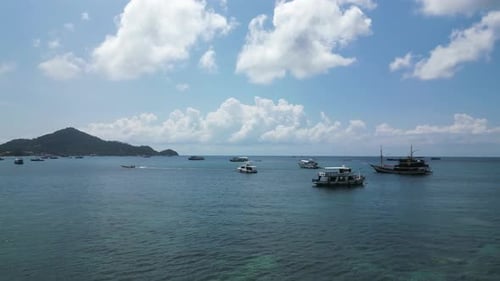 Aerial view of many boats along Sairee beach on Ko Tao island, Thailand.