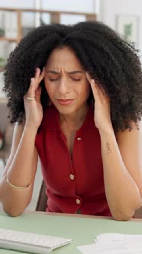 Headache, woman and burnout in office with migraine, frustrated or stress