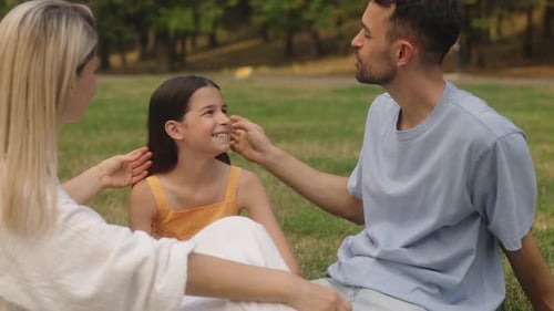 Happy Family Enjoying Quality Time Together in the Park