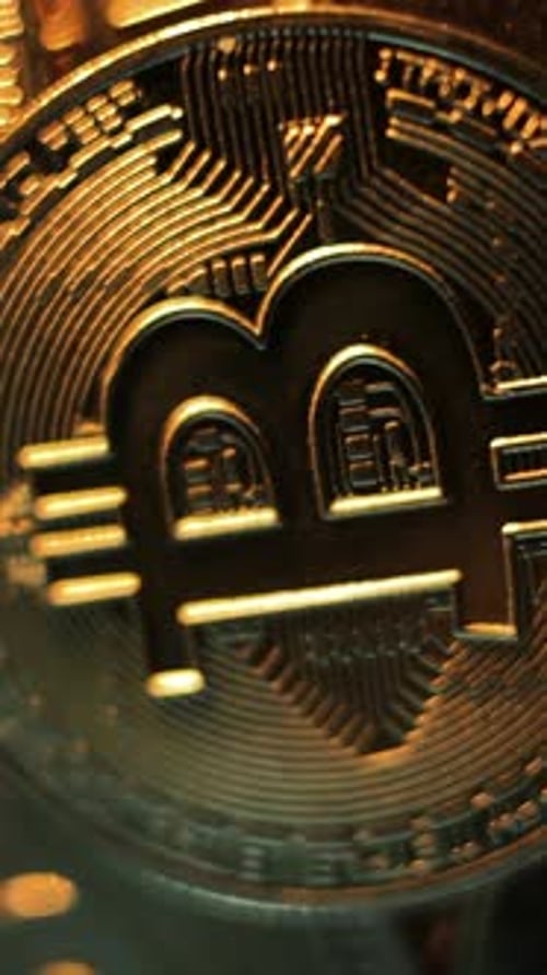 Virtual Internet Crypto Currency Gold Bitcoin BTC Macro Shot of Rotating Bitcoin Vertical Video