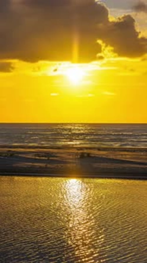 Vertical Timelapse Golden Sunset Over Sea