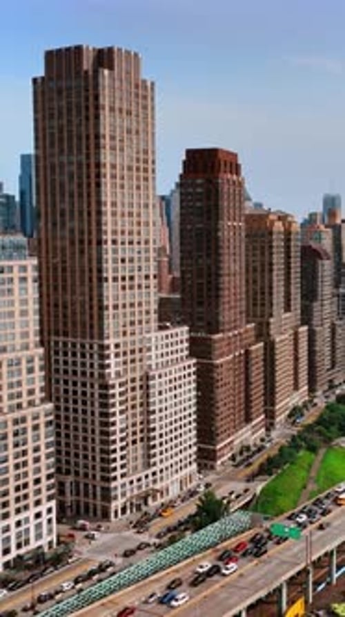 New York city buildifing on aerial view. Flying backwards above nyc city.