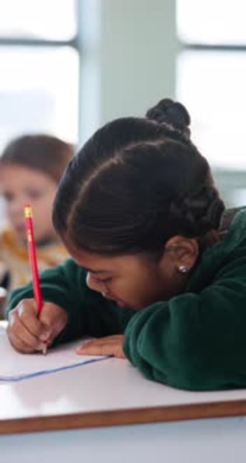 Education, child and writing with book in class, development and knowledge for growth at school
