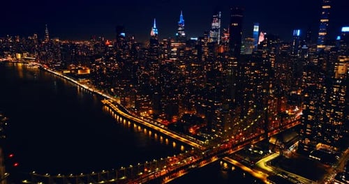 Amazingly lit streets, roads, bridges and buildings of New York, the USA