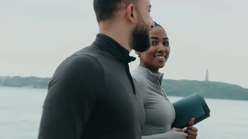 Diverse Fitness Partners Walking Together Before Outdoor Workout