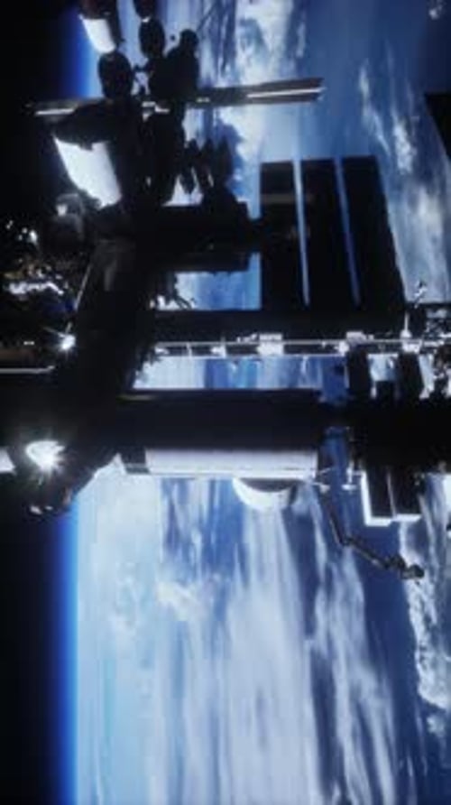 International Space Station Rotates Solar Panels In Outer Space Vertical