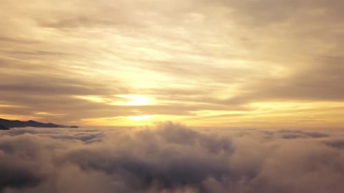 Aerial View of Clouds at Sunset