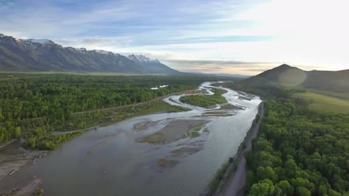 Gorgeous Drone View of Mountains and Green Forest by River 3 Above