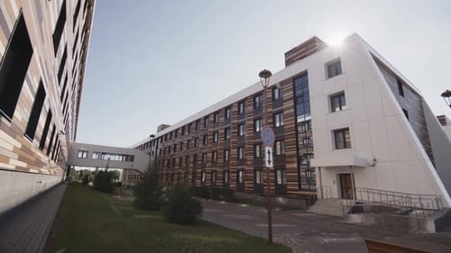 Hospital Buildings with Striped Facades and Tunnel Bridge
