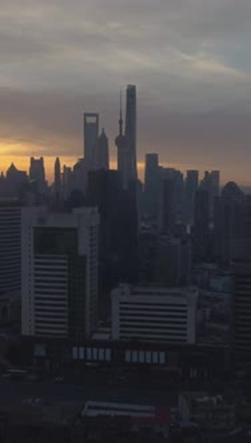 Shanghai Skyline at Sunny Sunrise Aerial View China Flying Forward Vertical Video