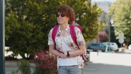 Young Man Experiencing Stomach Pain Outdoors