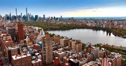 View of the Central Park surrounded by beautiful urban architecture.
