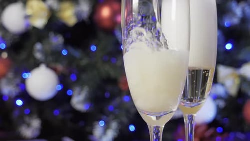 Champagne Poured at Christmas Time Celebration