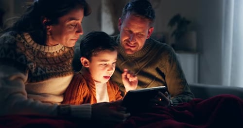 Family Togetherness: Cozy Evening Tablet Time Indoors