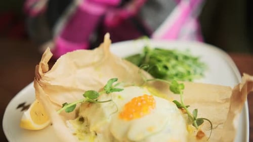 Close Up of Gourmet Fish Dish with Greens