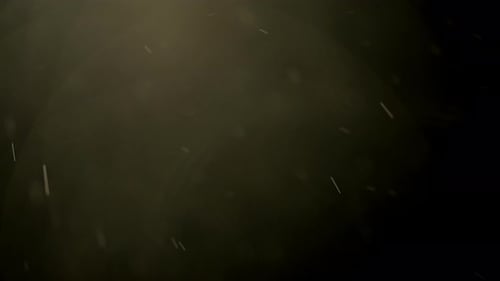 Dust Particles Floating in a Dark and Eerie Atmosphere Creating a Mysterious and Ambient Background
