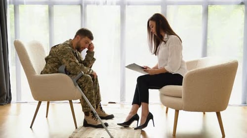 Soldier in Therapy Session with Counselor