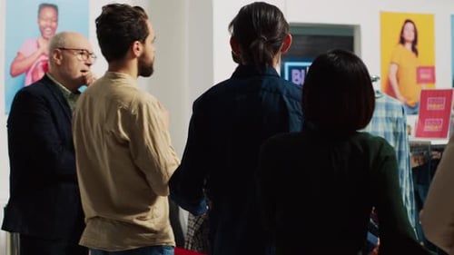 People Queue in Clothing Store Waiting in Line