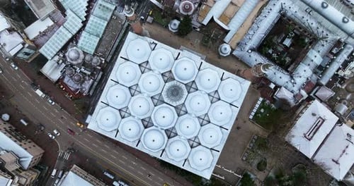 Top Down View Of The Grand Mosque Of Bursa With Snow In Bursa,Turkey - drone shot