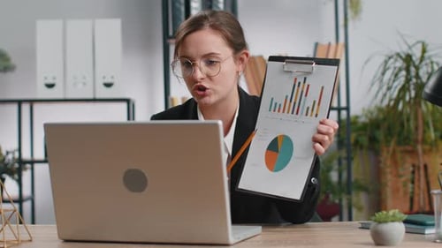 Business Woman Working at Office Talking Online Communication Video Call Shows Graphical Analytics