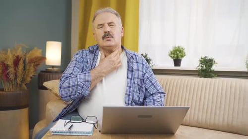 Man with sore throat.