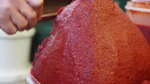 Homemade Red Chili Paste Preparation in a Local Kitchen