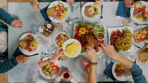 Family Dinner Overhead Shot, Diverse Appetizers and Salads