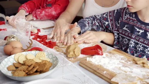 Family Baking Holiday Cookies Together at Home