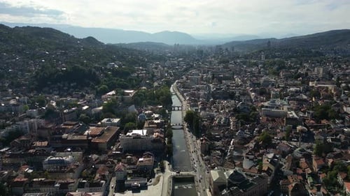 Panoramic Aerial View of Buildings in the Historic Center of Sarajevo and the Miljacka River Bosnia