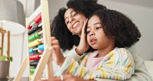 Education, mother and child with abacus, math and learning with family, counting