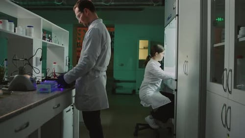 Scientists Working in Modern Laboratory Setting
