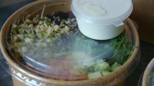 Fresh Salad Bowl with Vegetables and Creamy Dressing