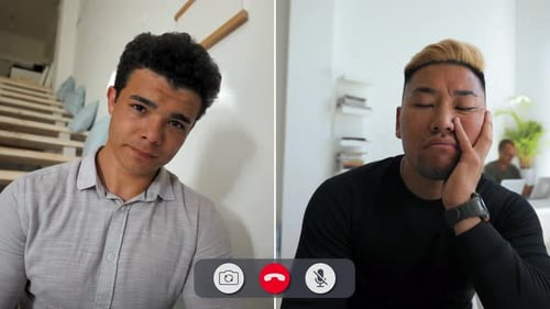 Bored Man on Video Call with Friend During Online Chat Session